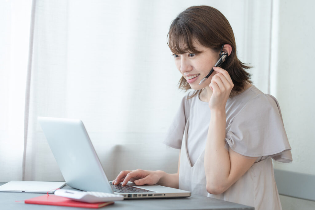 Japanese woman doing desk work at home